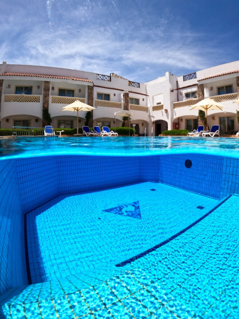 WhatsApp Image 2026-09-16 at 15.41.20 Camel Dive Club training pool with the boutique hotel rooms behind, Sharm el Sheikh