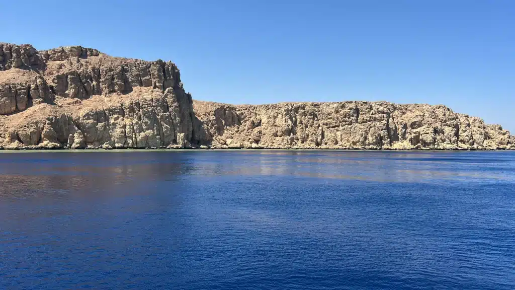 ras-mohamed Desert cliffs above the blue water of Ras Mohammed National Park, near Sharm el Sheikh